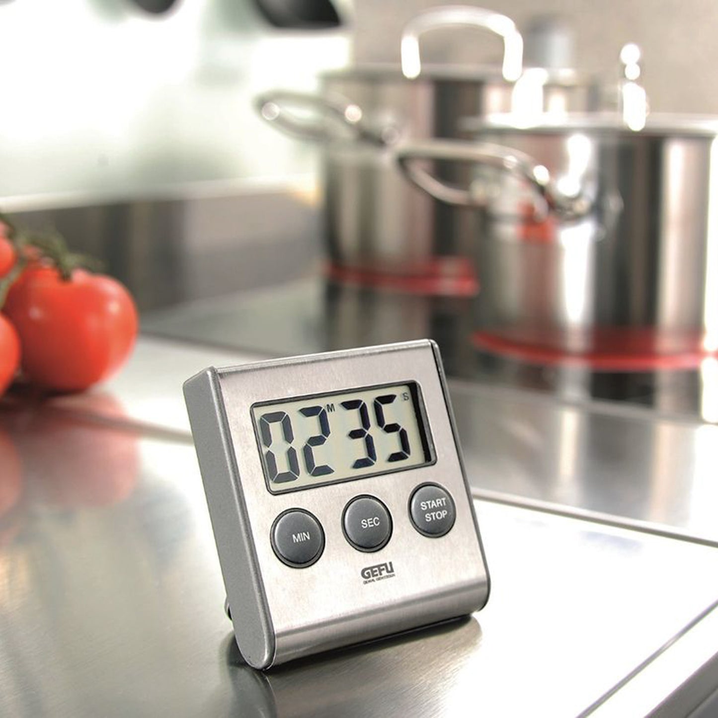 Digital timer with angled stand, LCD time display, and MIN/SEC/START STOP control buttons