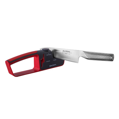 Knife sharpener with red frame and metal guide, marked GLOBAL and grit levels