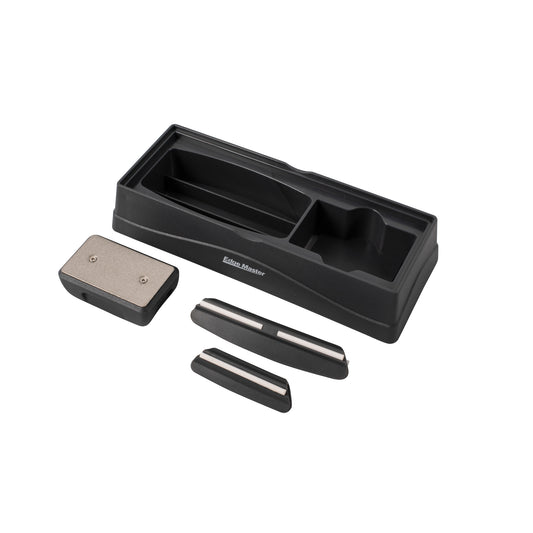 Stone sharpening station with black base tray, gray sharpening stone, and three metal bars