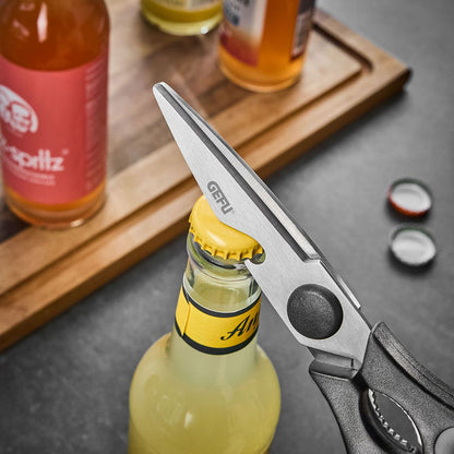 General-purpose scissors with pointed steel blades and dark textured finger grip