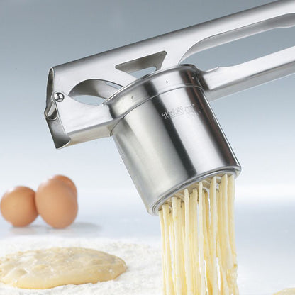 Stainless steel potato & spaetzle press squeezing pasta strands