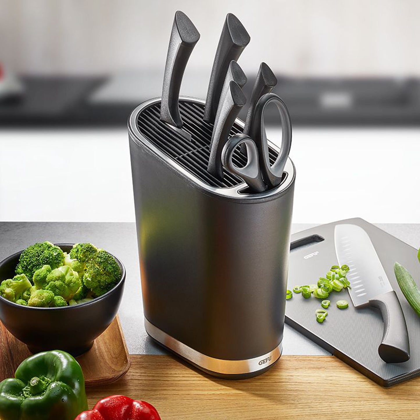 SMARTLINE knife block holding five black-handled knives in a metal holder