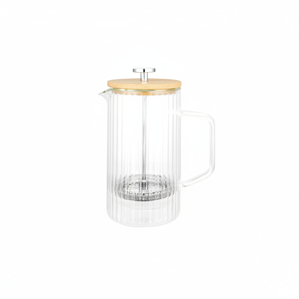 Clear glass pitcher with wooden lid on a white background