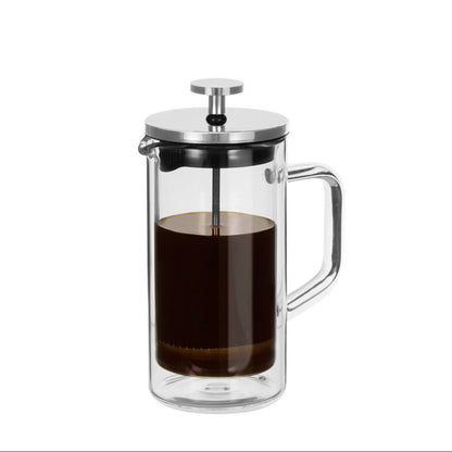 Clear glass French press with coffee on a white background