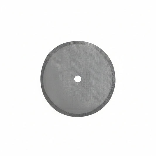 Round metallic disc with a central hole on a white background