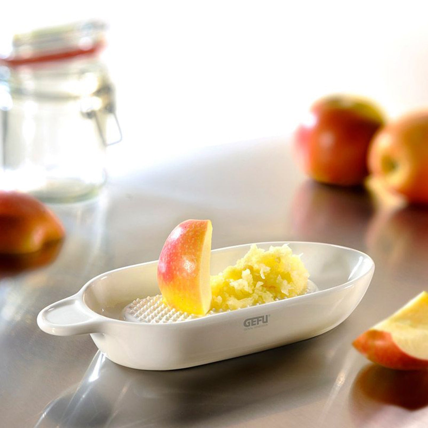 FRUTTARE grater bowl with grated ginger on fine grating tray