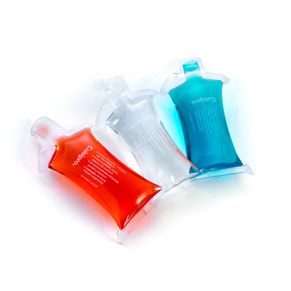 Soap concentrate refill pouches in blue and orange with clear nozzle spouts