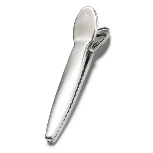 Silver stainless bag clip with ridged grip handle and loop for storage