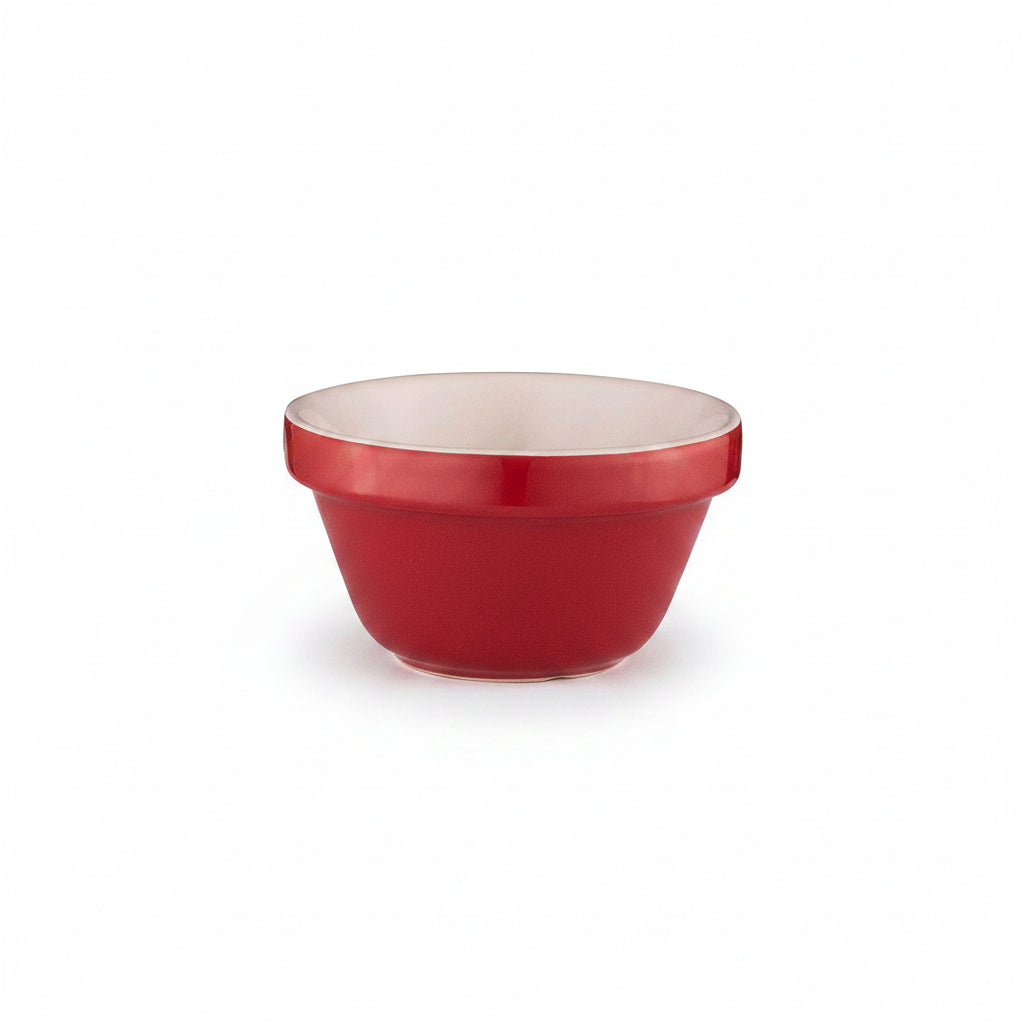 Red mixing bowl with white interior on a white background
