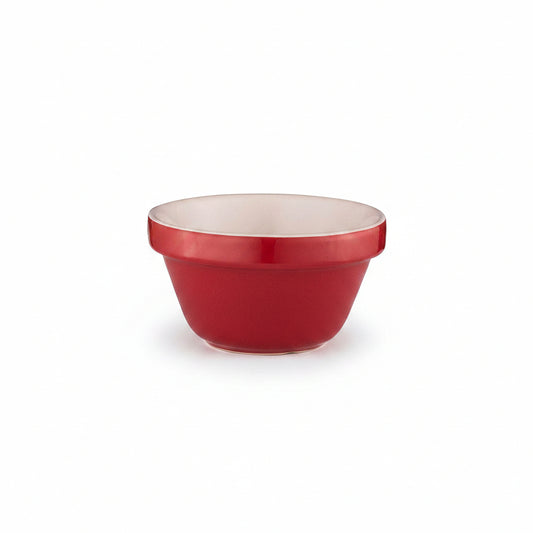 Red mixing bowl with white interior on a white background