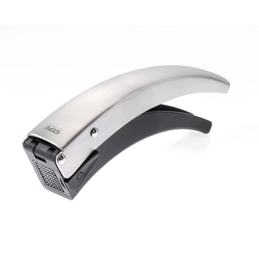 Silver-and-black garlic cutter with curved lever and grated cutting surface