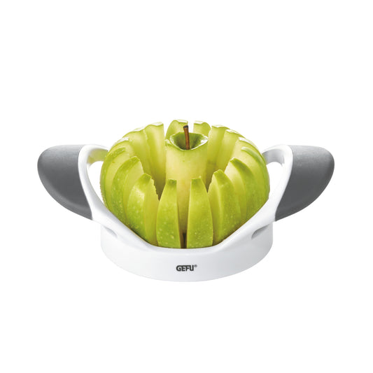 PARTI apple divider with white base and gray handles holding green apple wedges