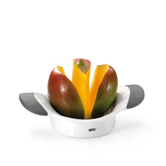 Mango cutter with white base bowl holding sliced mango wedges