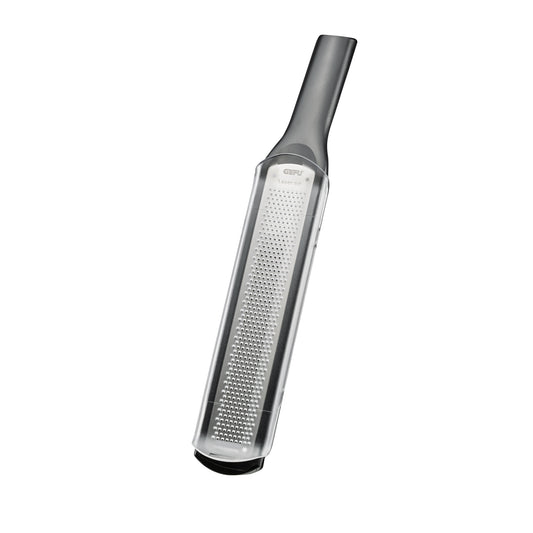 Fine grater with perforated metal surface and dark handle