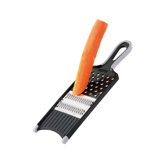 Julienne slicer with black base, metal blade insert, and ergonomic handle holding an orange carrot