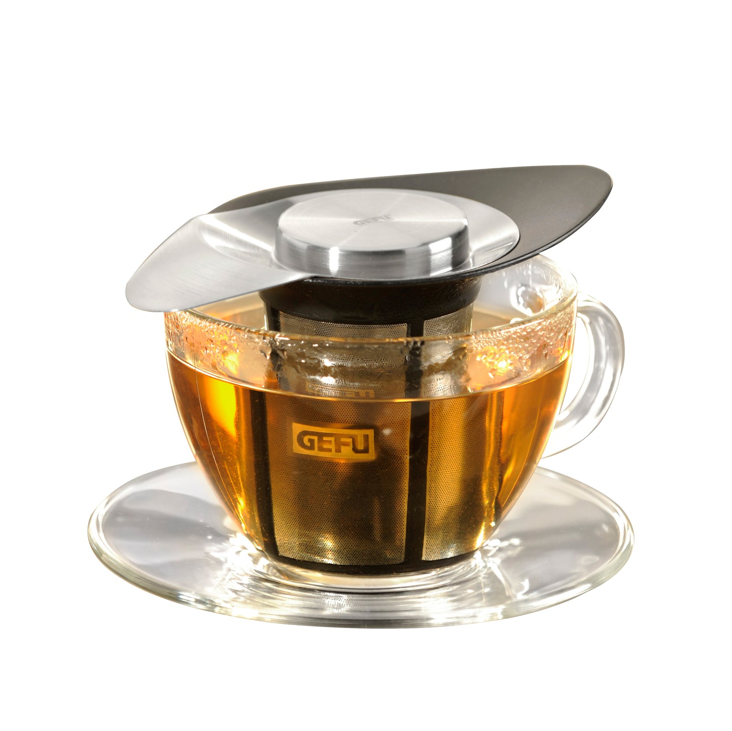 ARMONIA tea filter set with lid over glass cup of brewed tea