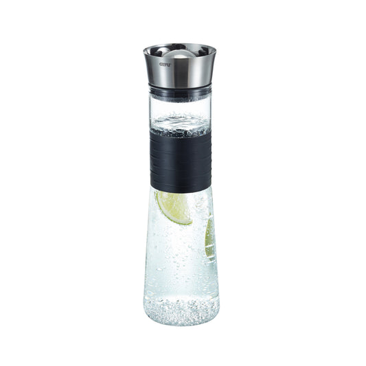 Glass decanter with stainless steel top, black band, and lime slice