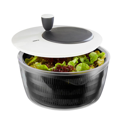ROTARE salad spinner lid open, showing greens in clear bowl with black basket
