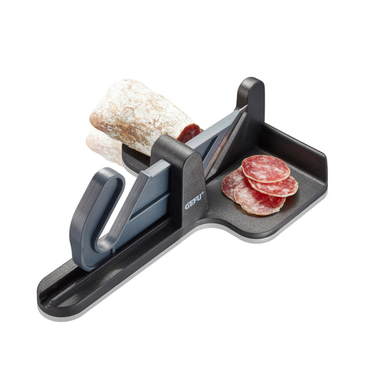 Handheld sausage slicer with dark base and lever, featuring a slicing platform