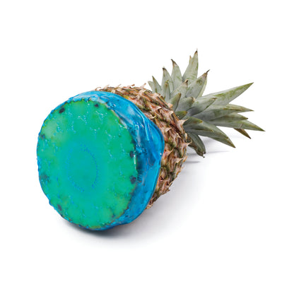 Large CoverBlubber: teal-blue cover wrapped around a whole pineapple with crown leaves