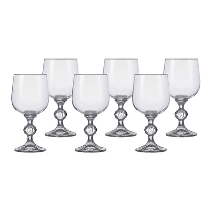 Six clear stemmed wine glasses with faceted bases and rounded bowls