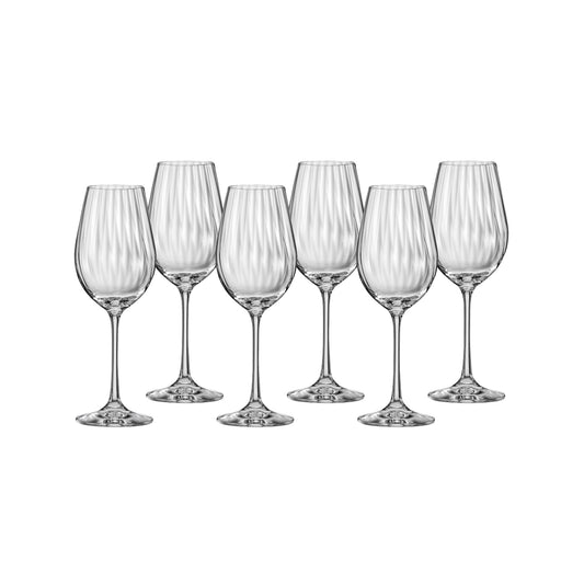 Six waterfall-style wine glasses with fluted stems and clear glass bowls