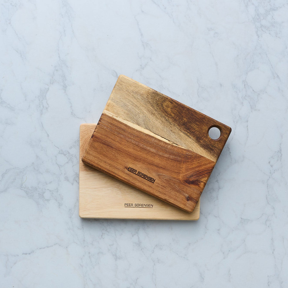 Rectangular wooden utility cutting board with hanging hole and engraved logo
