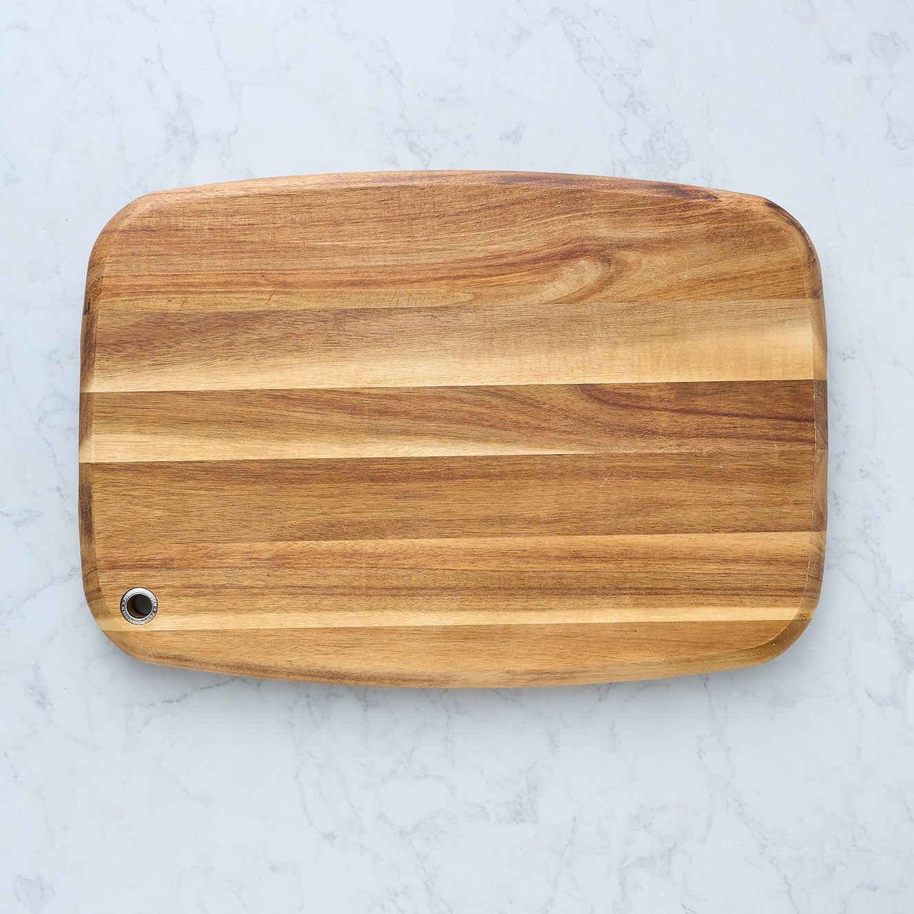 Wood cutting board with finger loop handle and smooth flat surface