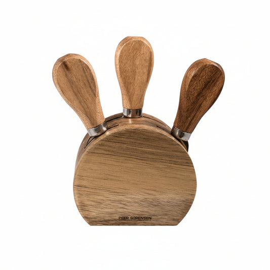 Wooden knife block set with three knives on a white background