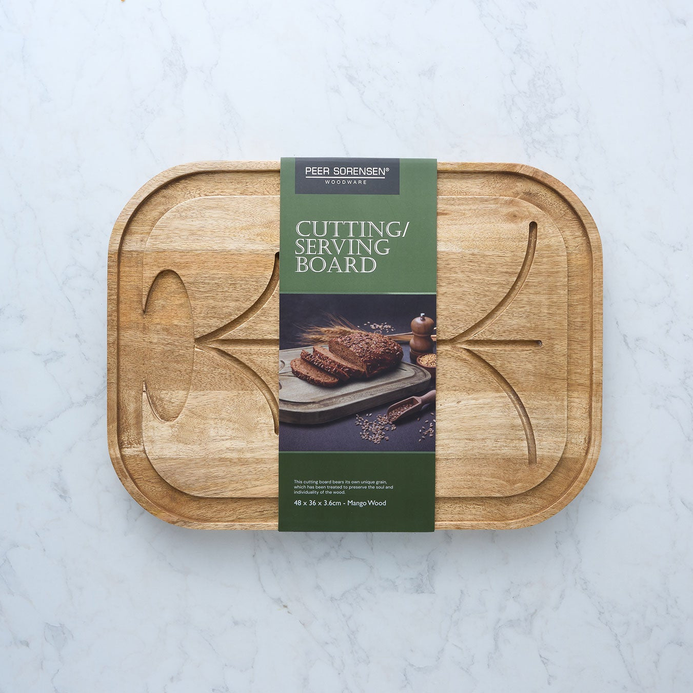 Mangowood cutting and serving board in retail packaging