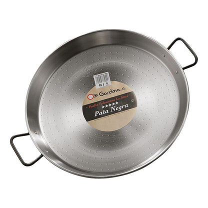 Perforated stainless paella pan with two side handles, underside view with label