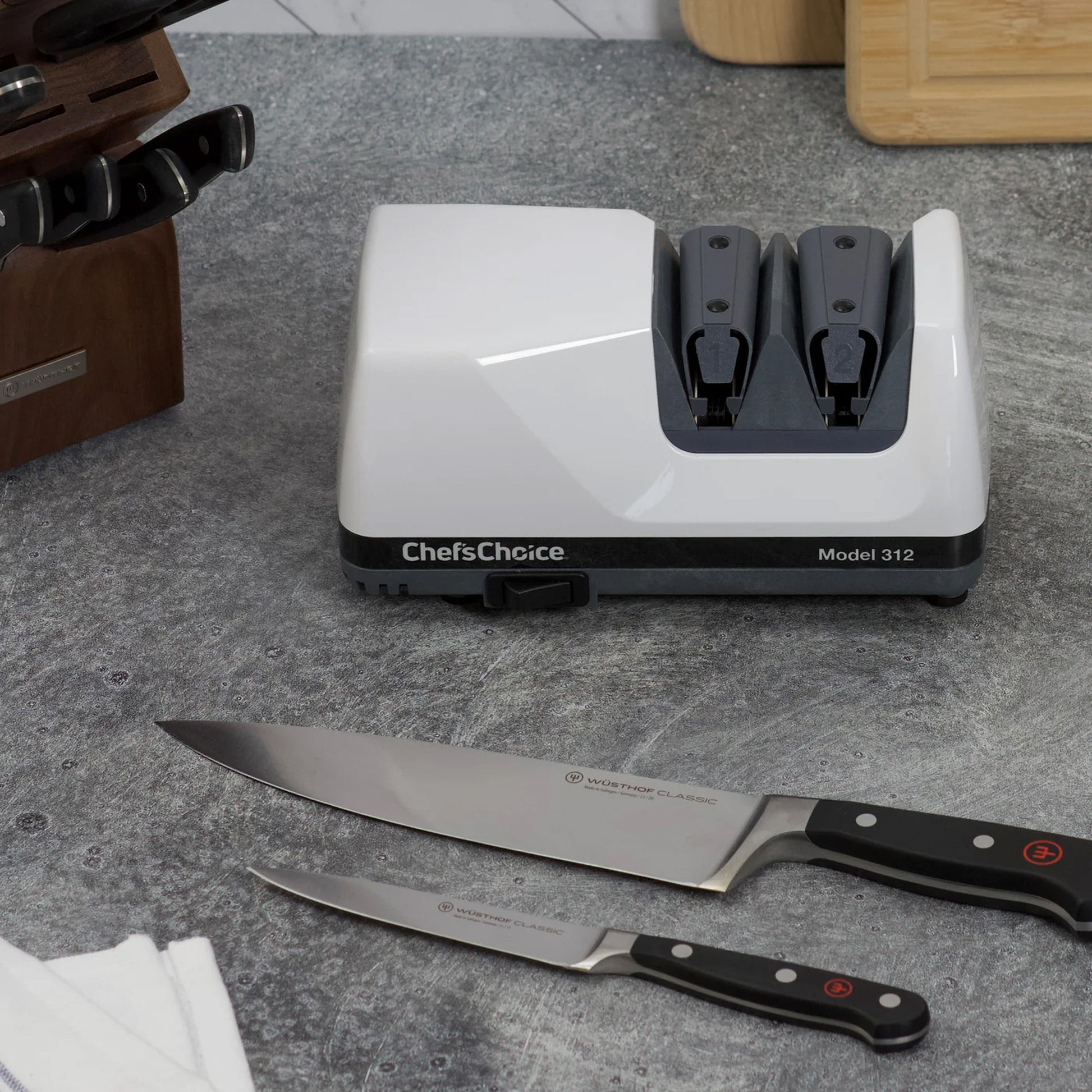White countertop knife sharpener with two sharpening slots