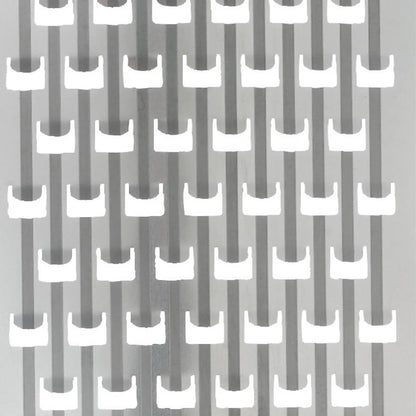 Rotary grater blade teeth on metal drum surface