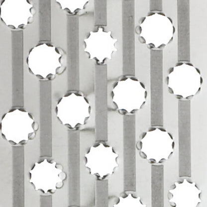 Stainless grating surface with circular cutouts for shredding