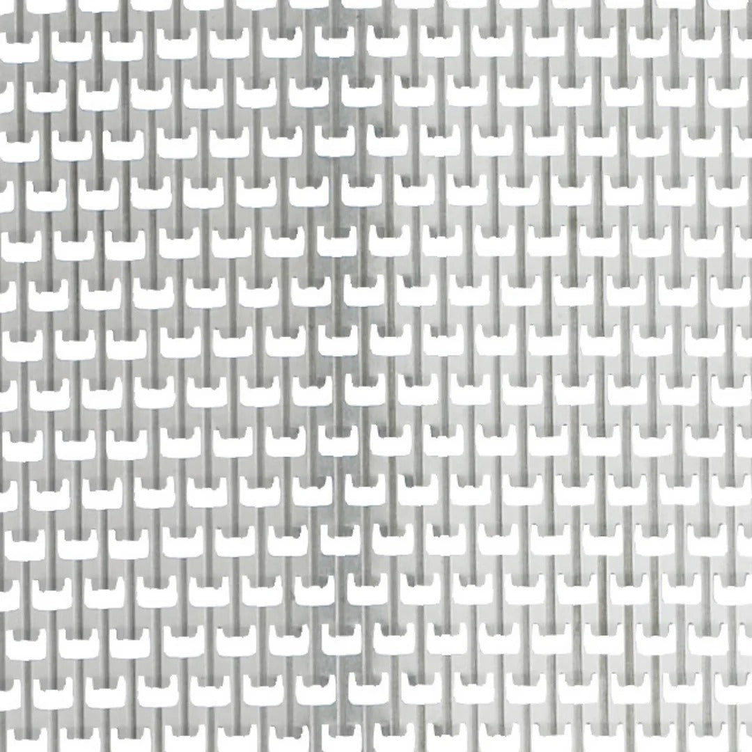 Close-up of box grater fine grating openings on silver surface