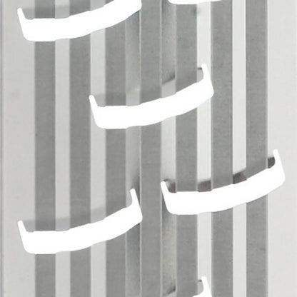 Close-up of box grater coarse grating slots on silver plate