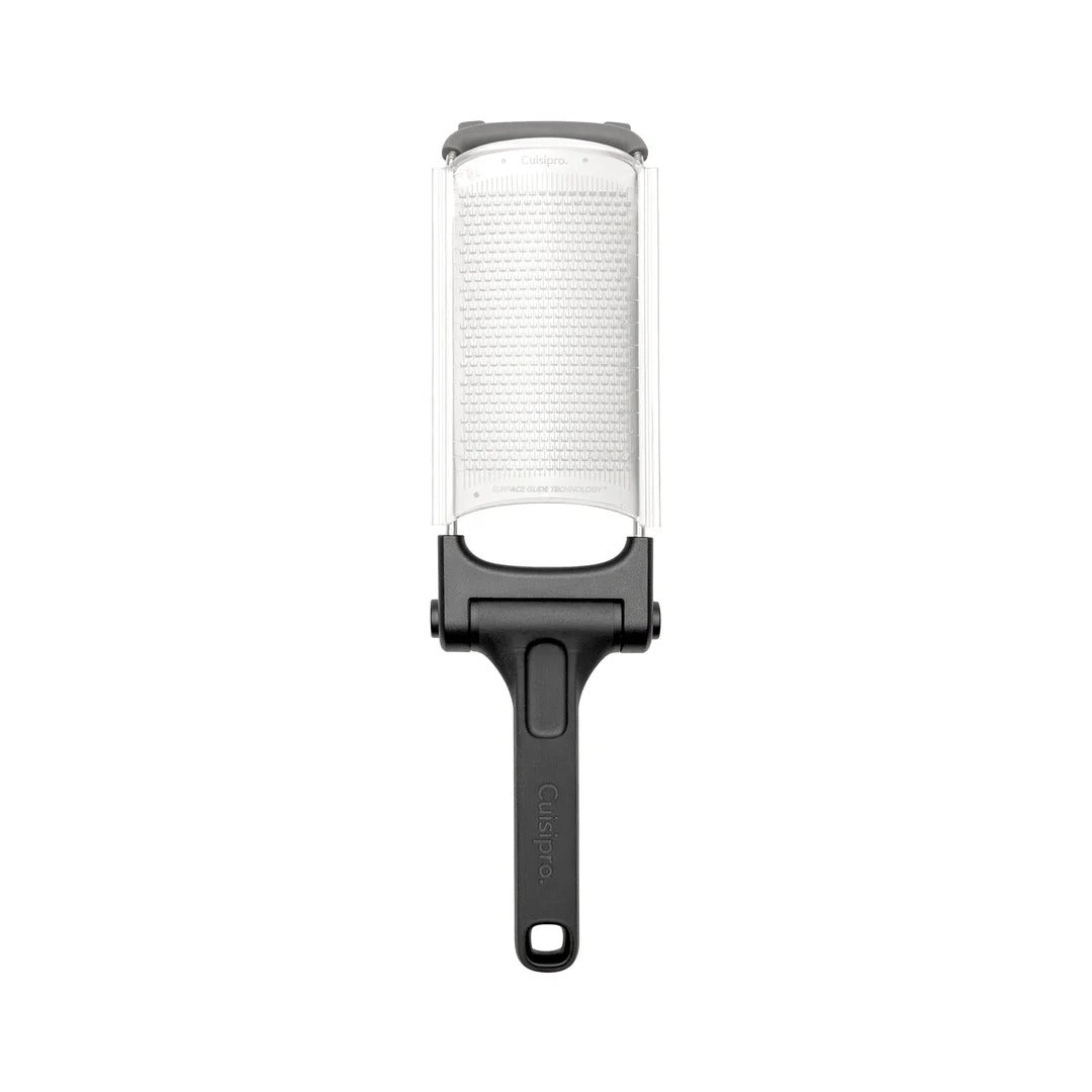 Folding grater with white grating drum, black folding handle, gray safety cap