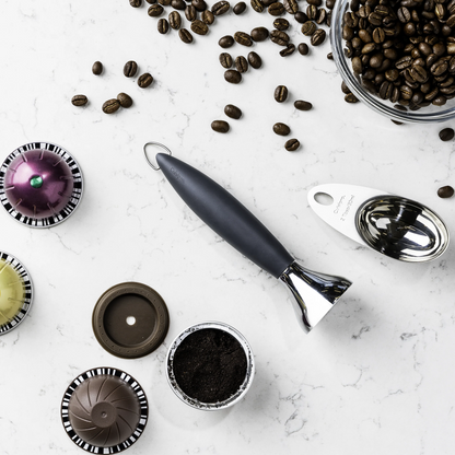Coffee tamper with dark handle and shiny chrome base
