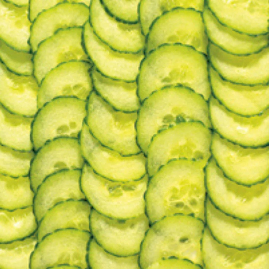 Box-grater-cut cucumber slices, thin rounds stacked and overlapping