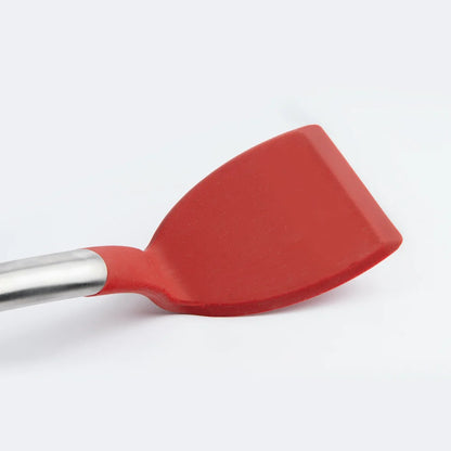 Red silicone turner head attached to a silver metal handle