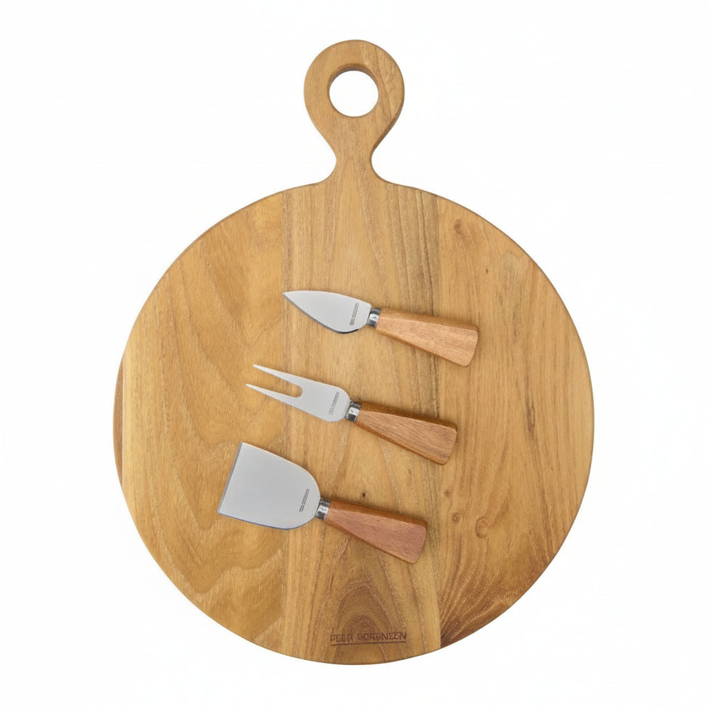 Wooden round cutting board with three cheese tools on a white background