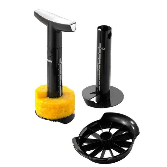 Pineapple slicer handles and base with round slicing disc, shown with pineapple