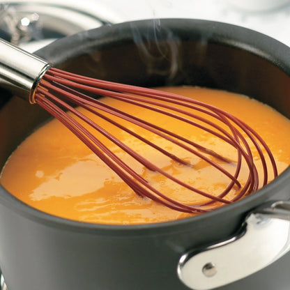Balloon whisk with brown silicone wire loops and stainless steel handle
