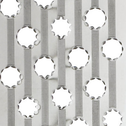 Rotary grater drum with circular metal grating holes