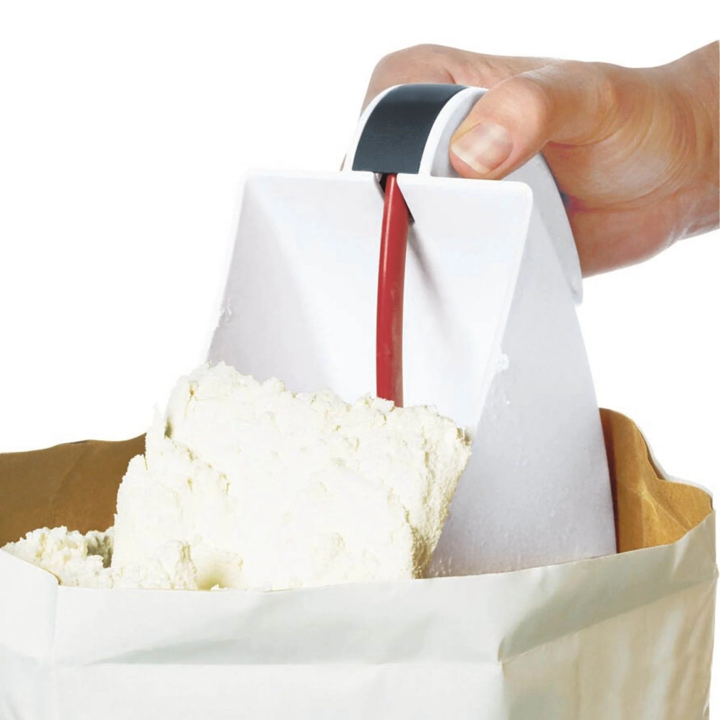 Flour sifter held above flour, red frame and white scoop