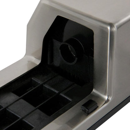 Inside view of black sharpening chamber with metal silver frame and guide slots